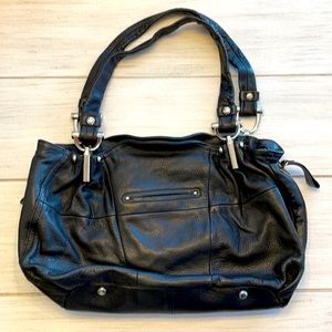 Black leather B. Makowsky purse with leopard print inside
